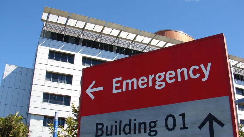 Emergency sign and front driveway of Princess Alexandra Hospital in Brisbane