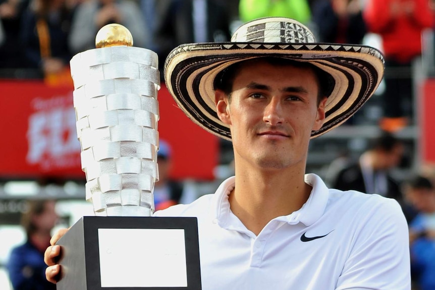 Bernard Tomic with his trophy in Bogota