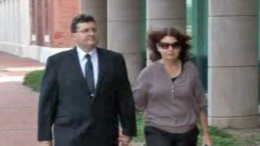 Former School of the Air principal John McHale and his wife enter the Geraldton court