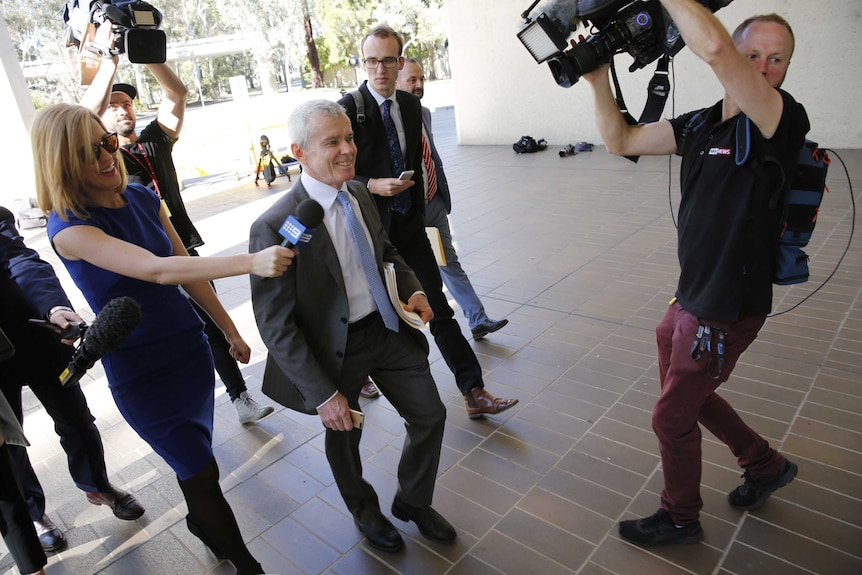 Senator Malcolm Roberts arrives at the High Court to plead his case in the hearing over his dual citizenship.