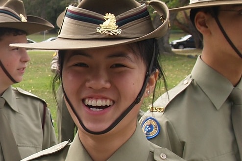 Annie in her army cadets uniform, another girl beside her smiling.