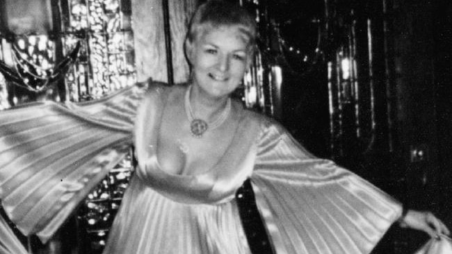 A black and white photo of Shirley Finn wearing a flowing ball gown