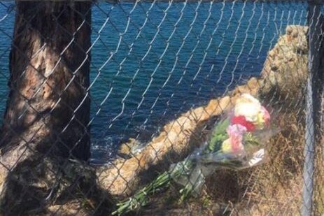 Floral tribute at Blackmans Bay cliff where a 17 year old died after falling January 29, 2017