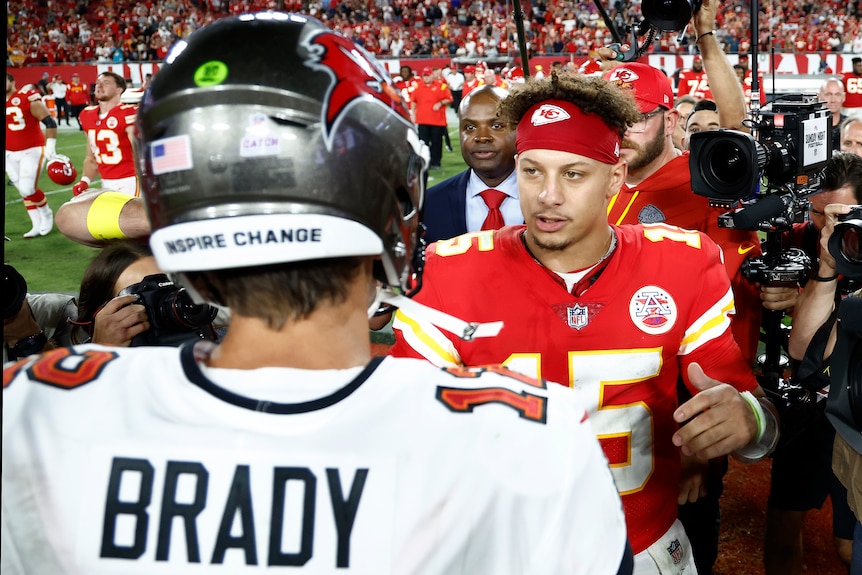 Tom Brady shakes Patrick Mahomes's hand after the Super Bowl.