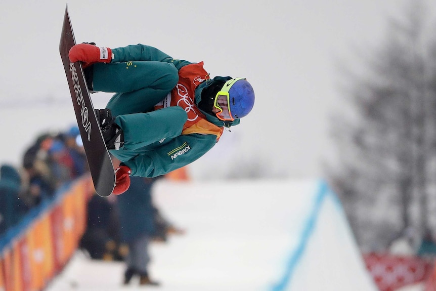 Scotty James in mid-air during the men's halfpipe final at the Olympic Winter Games in Pyeongchang.