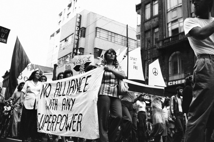 protesters march in a New Zealand street