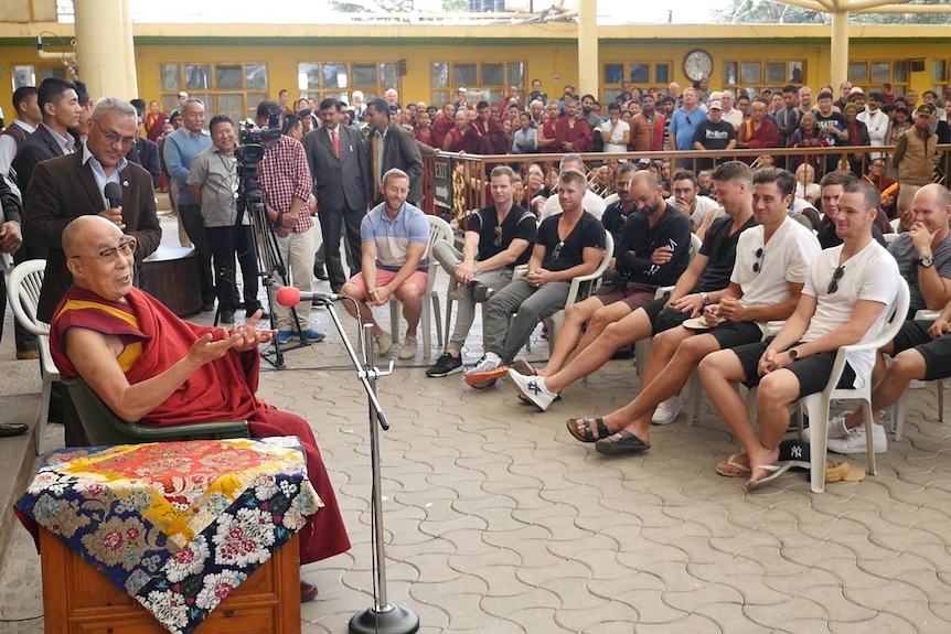 The Dalai Lama speaks to the Australian cricket team.