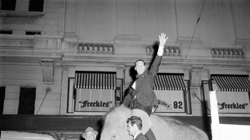 Don Lane riding an elephant in 1967.