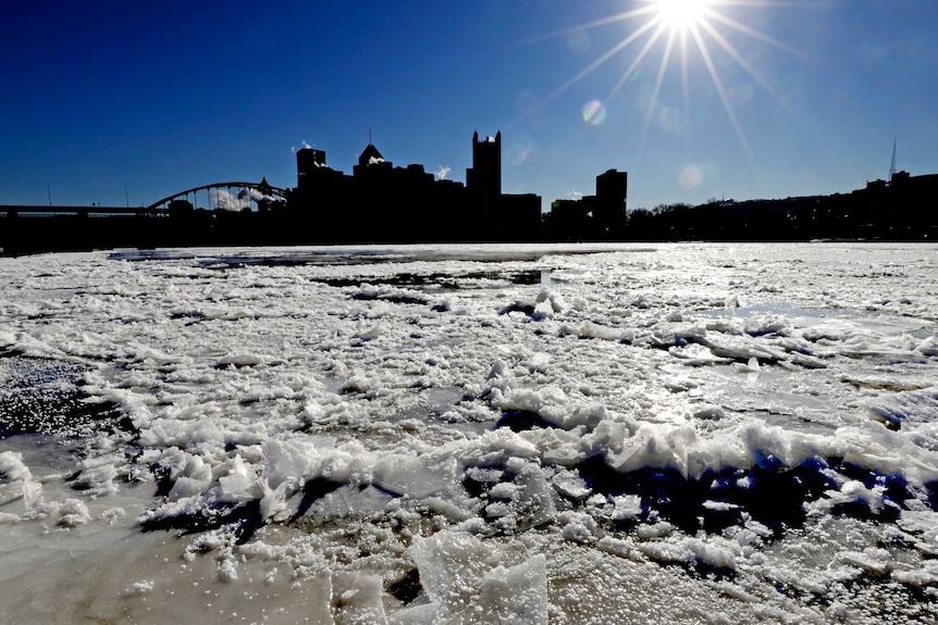 Sunrises over downtown Pittsburgh and a partially frozen Allegheny River.