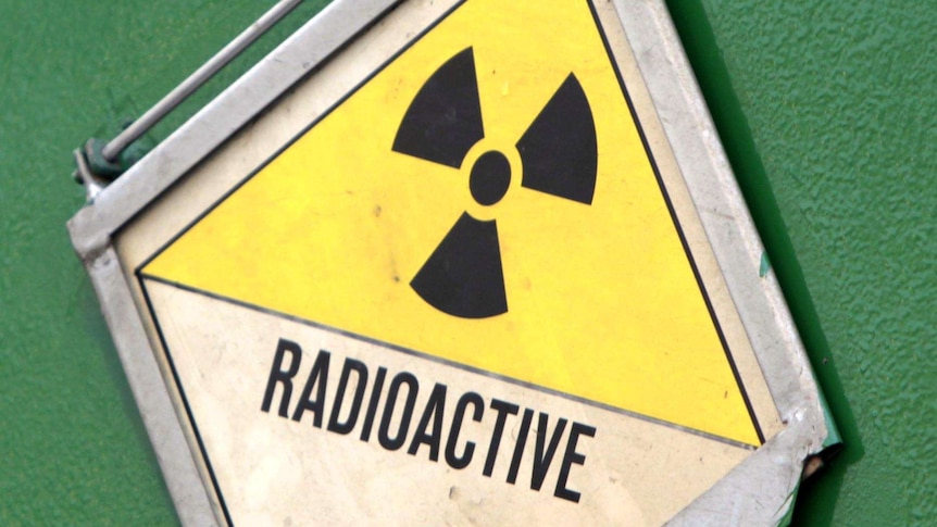 Radioactive symbol on a container carrying highly radioactive nuclear waste.