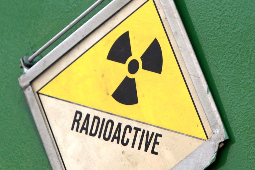 Radioactive symbol on a container carrying highly radioactive nuclear waste.