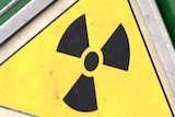 Radioactive symbol on a container carrying highly radioactive nuclear waste.