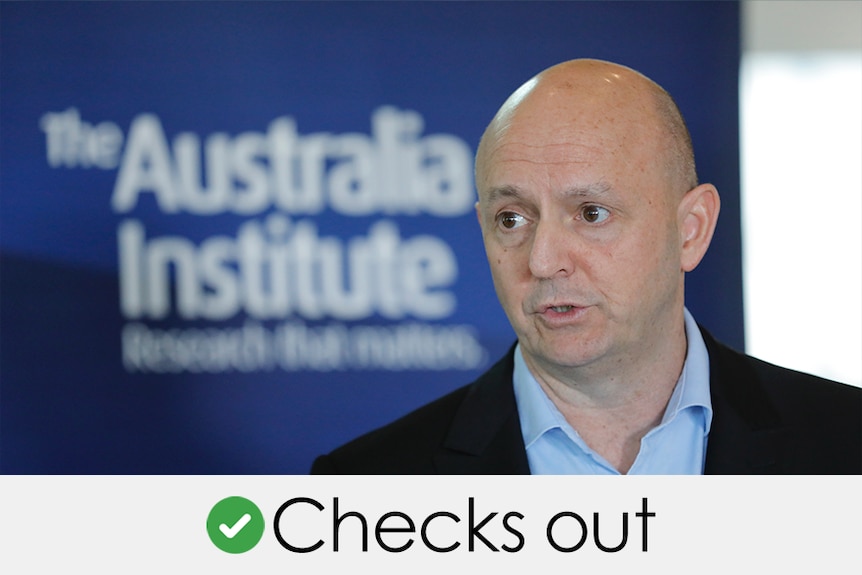 A man with a shaved head talking in front of a blue Australia Institute logo. Verdict: CHECKS OUT