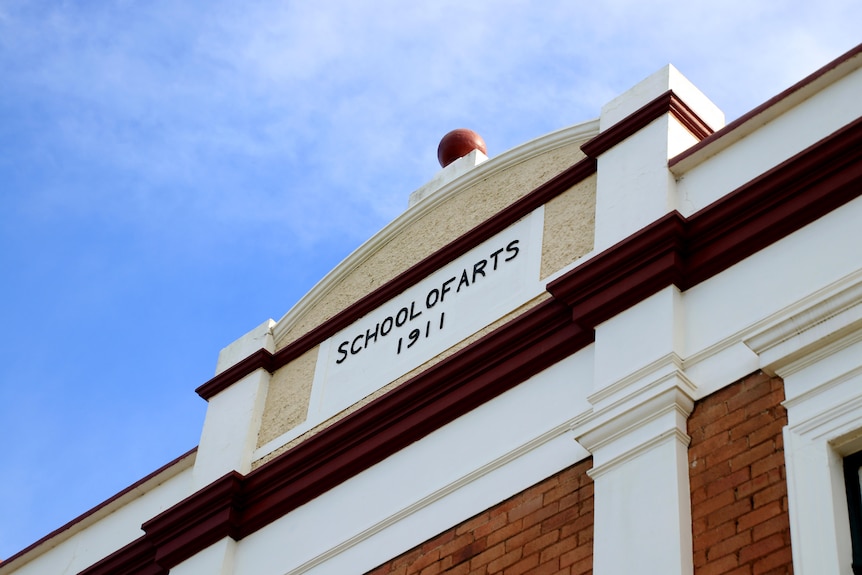 The front facade of the Clifton School of Arts, showing the date of when it was built - 1911.