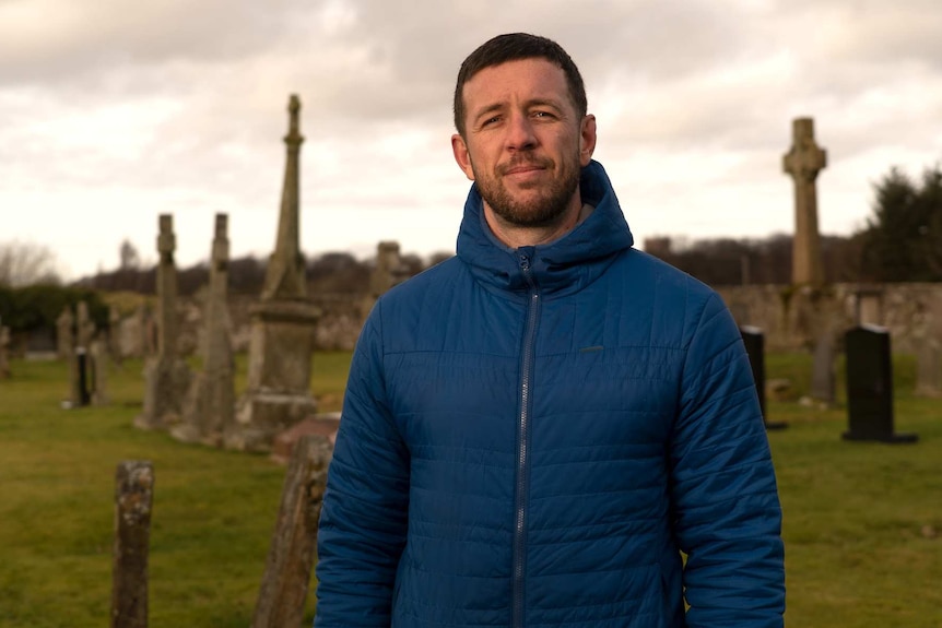 Journalist Gordon Blackstock at St Mary's cemetery in Lanark.