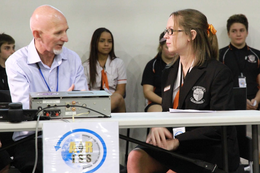 Amateur radio enthusiast Shane Lynd and Glenmore State High School student Stephanie Richter-Stretton.