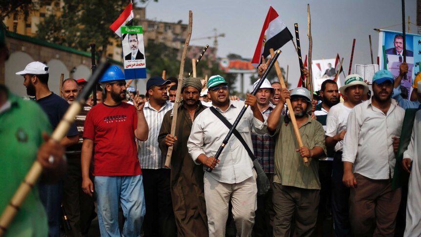 Supporters of Egyptian president Mohamed Morsi rally in Cairo