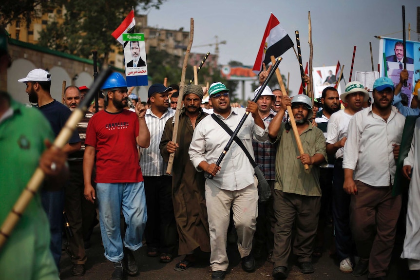 Supporters of Egyptian president Mohamed Morsi rally in Cairo