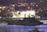 The Russian Navy's large landing ship Olenegorsky Gornyak underway at night.