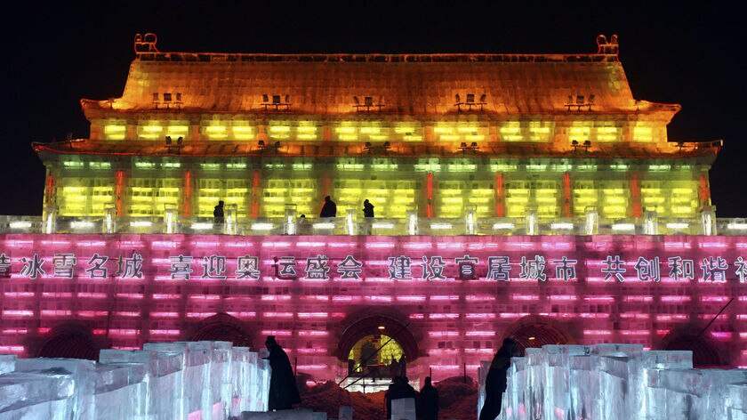 Ice sculptures of famous world sites, such as the Tiananmen gate, are on show at the Ice and Snow Festival at Harbin in China.