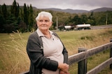 Aunty Helen Riley stands near Great Western Highway overlooking Hartley Valley