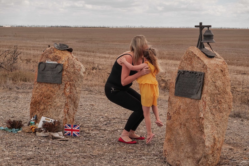 Visitors at a memorial to 2015 Esperance bushfire victims.