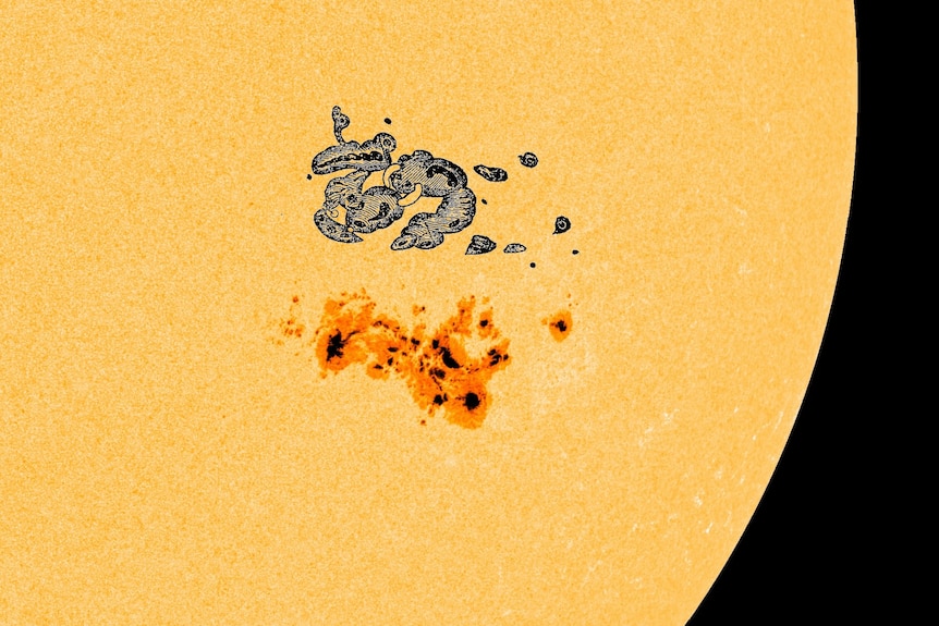 A close up of the sun with one orange irregular blob, and another about the same size in gray above it.