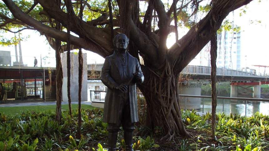 Statue of Robert Towns in Townsville, Queensland under a tree.