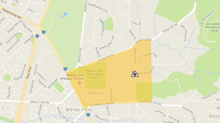 Watch and act bushfire warning for Kalamunda, east of Perth.