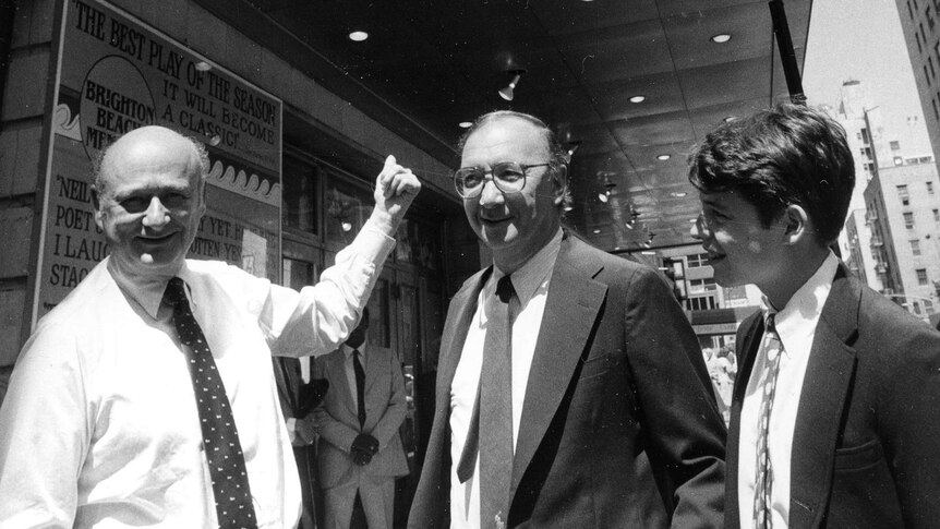 Mayor Ed Koch, Neil Simon and Matthew Broderick in 1983, pointing to a new marquee at the Neil Simon Theatre.