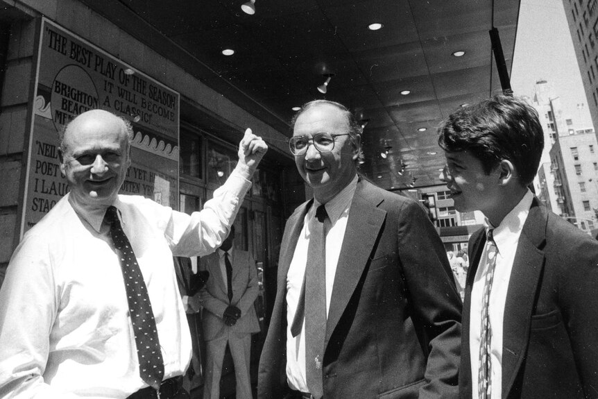 Mayor Ed Koch, Neil Simon and Matthew Broderick in 1983, pointing to a new marquee at the Neil Simon Theatre.