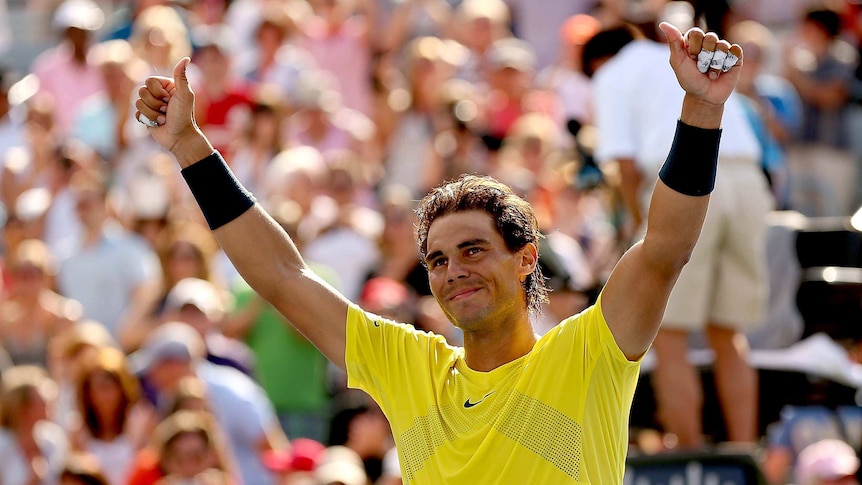Rafael Nadal celebrates his win over Milos Roanic