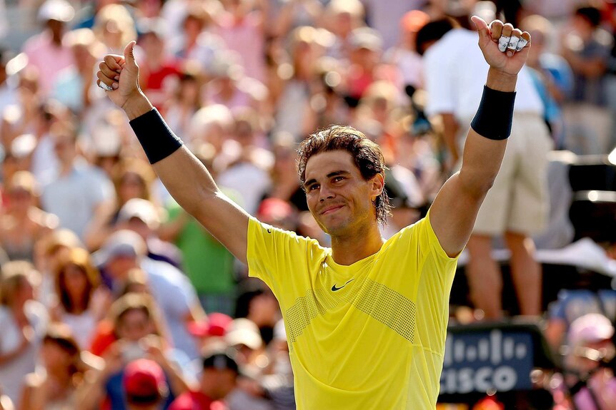 Rafael Nadal celebrates his win over Milos Roanic