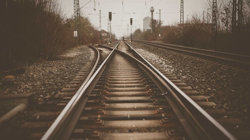 Train tracks in the fog