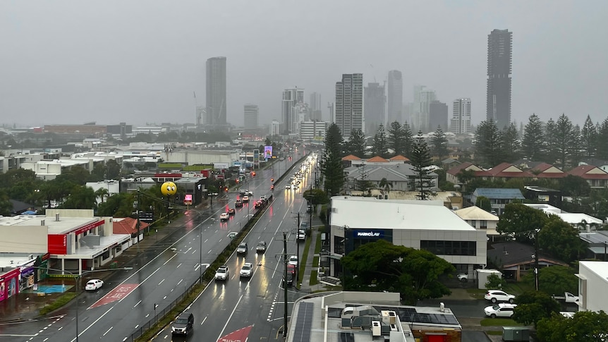 Heavy rain pouring down over Surfers Paraidse high rises