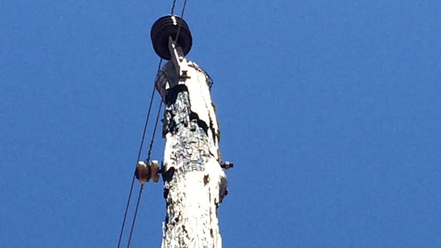 Close up of the top of a power pole that has been struck by lightning on a farm property in Boyup Brook, Western Australia.