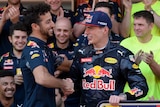 Daniel Ricciardo shakes Max Verstappen's hand