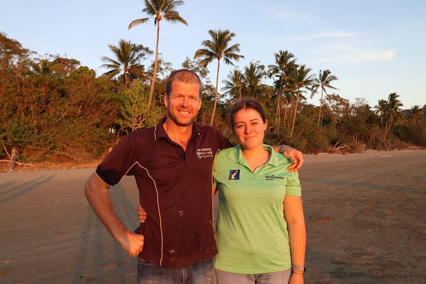 Operator of the Cape Hillsborough Tourist Park, Ben Atherton, and new wallaby tour guide Samantha Tilden.