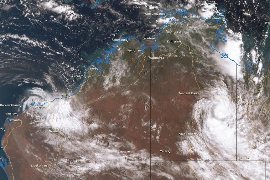 a satellite image of two tropical cyclones.