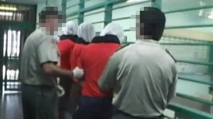 Don Dale detainees in hoods at Berrimah adult prison in August 2014