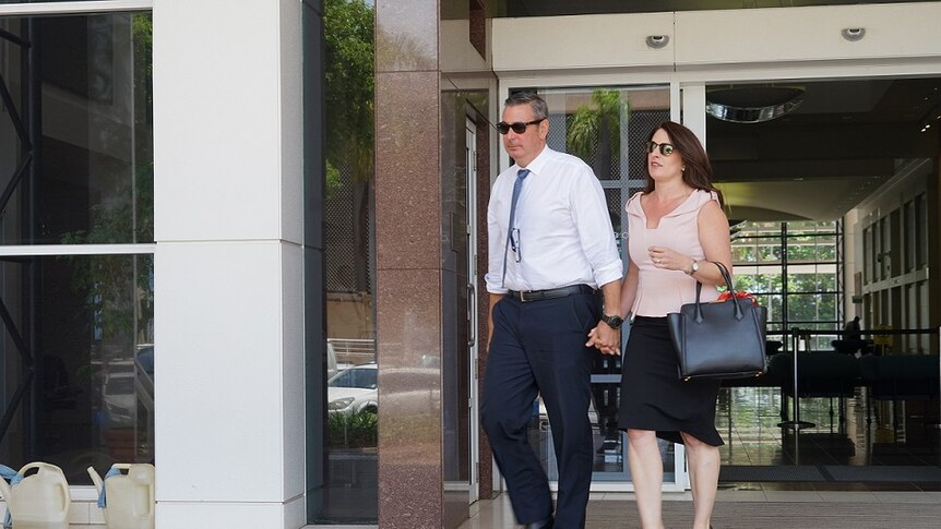 Chris Deutrom leaves the NT Supreme Court with his wife, Helen.