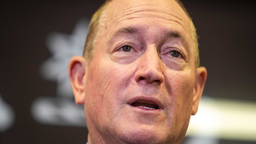 Senator Fraser Anning is seen holding a press conference in Brisbane.