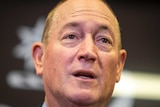 Senator Fraser Anning is seen holding a press conference in Brisbane.