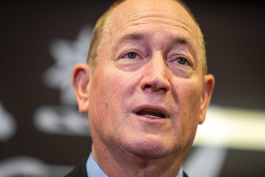 Senator Fraser Anning is seen holding a press conference in Brisbane.