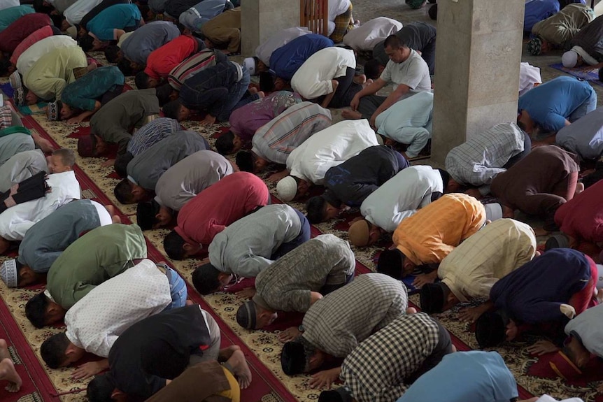 People in Purwakarta praying.