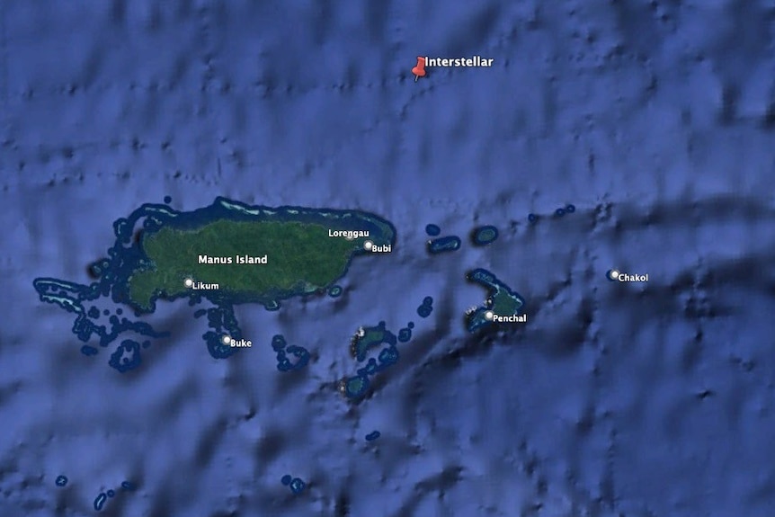 A map shows a location with a red pin in a blue ocean near islands represented as green shapes.