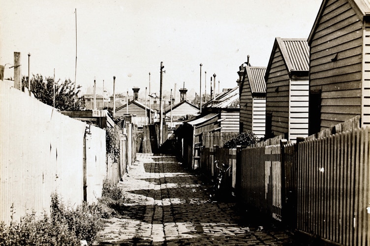 Thousands of people lived in ramshackle housing. Circa 1935