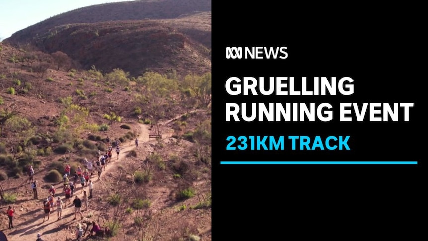 Gruelling Running Event, 231KM Track: Runners on an arid red track