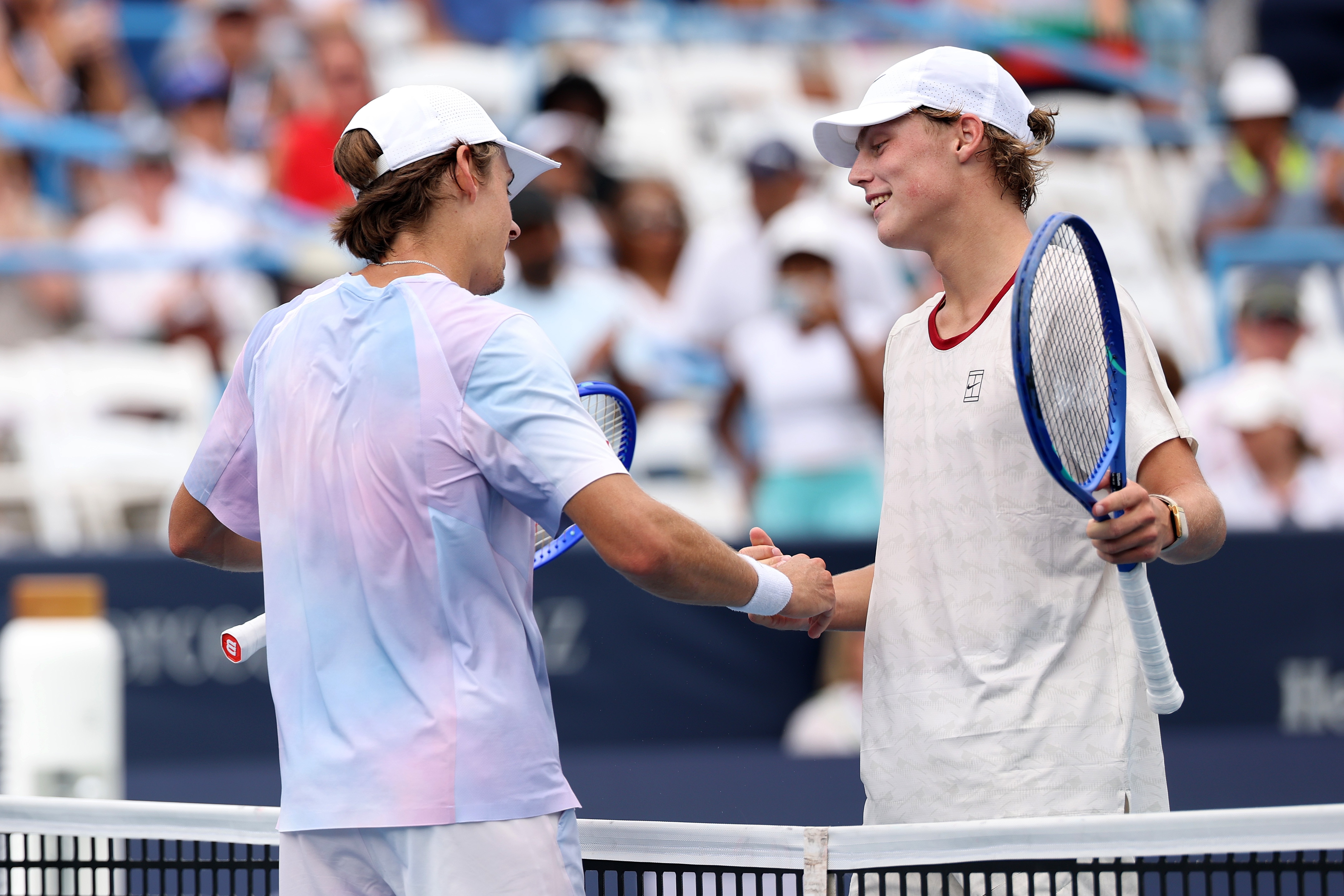De Minaur halts Hewitt's meteoric rise in Washington showdown