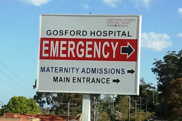 A Gosford Hospital sign pointing the way to the emergency department.